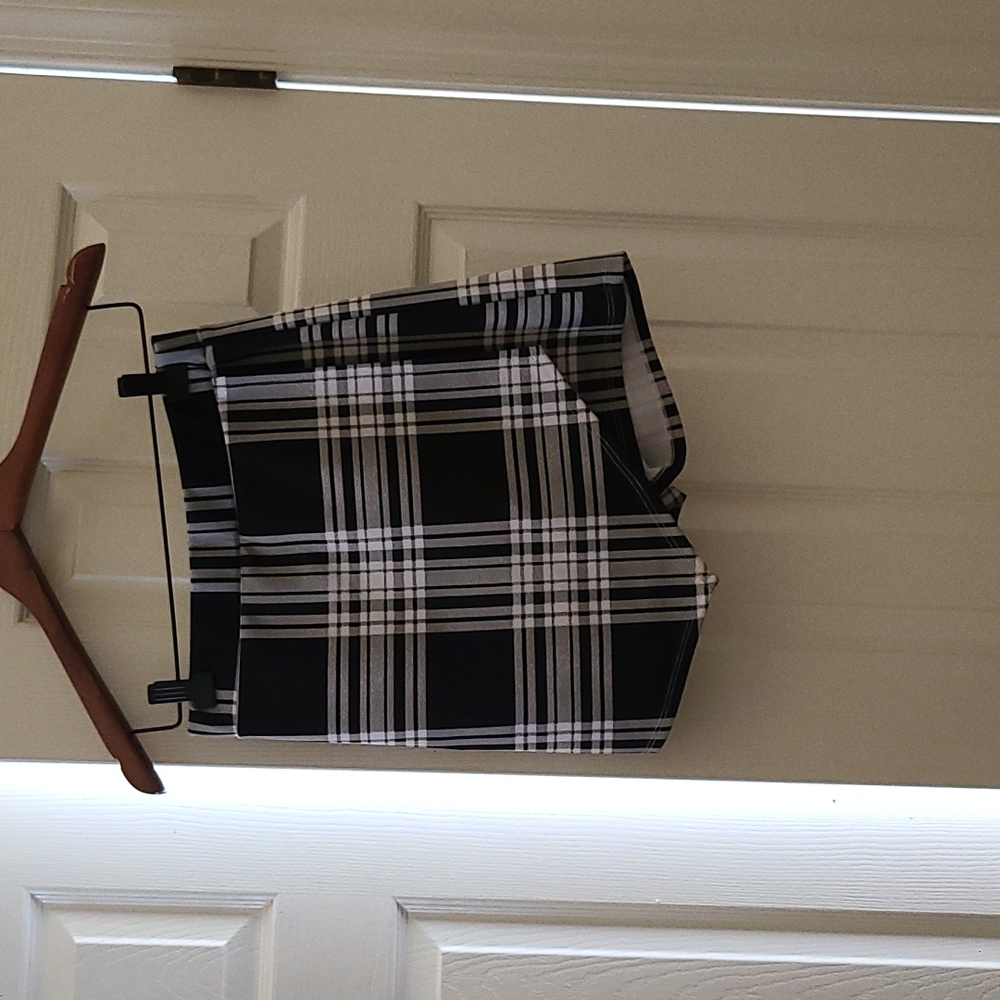 From Windsor, size medium Black and white stripes. Shorts with skirt front.